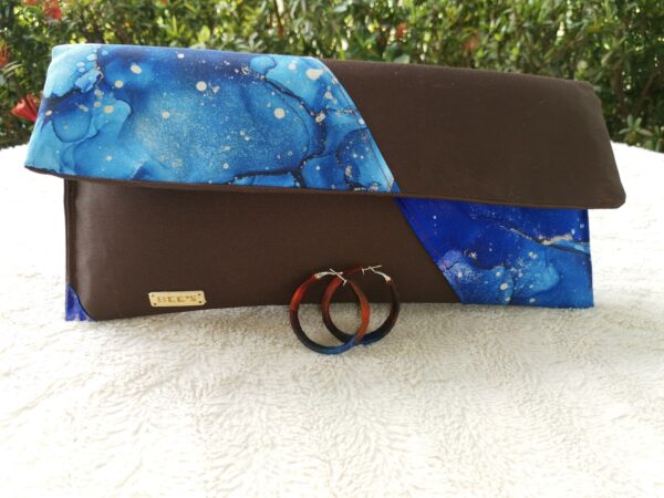 clutch bag with a matching pair of hoop earrings