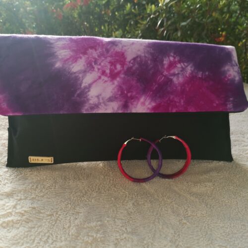 purple clutch bag with matching earring