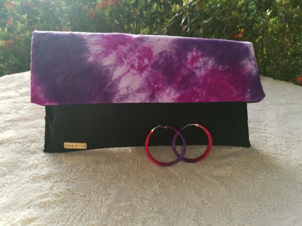 purple clutch bag with matching earring