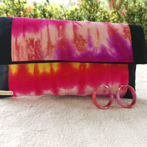 clutch bag with a matching pair of hoop earrings