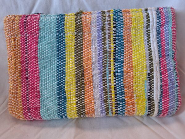 Hand-woven by Ade clutch bags, one-of-a-kind. With upcycled fabric. They are also lined with foam and other fabrics.