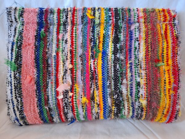 Hand-woven by Ade clutch bags, one-of-a-kind. With upcycled fabric. They are also lined with foam and other fabric.